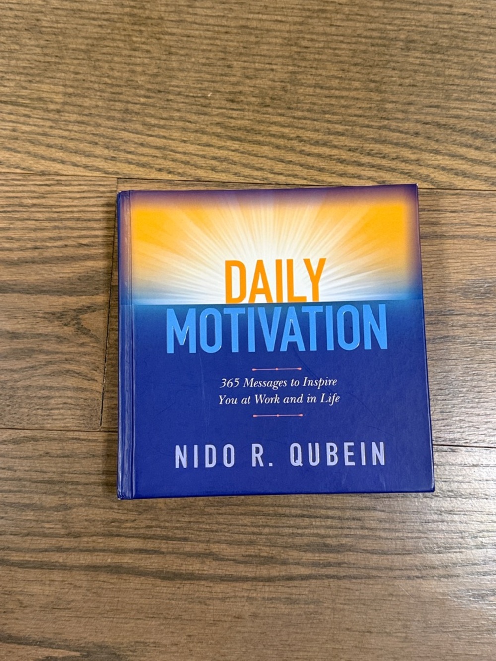 Daily Motivation by Nido R. Qubein - Blue and Yellow Hardcover